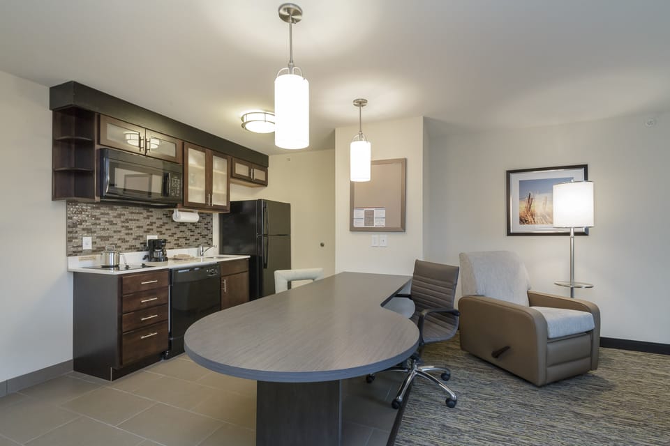 Suite, 1 Bedroom (1 Queen Bed) | Desk, iron/ironing board, free cribs/infant beds, rollaway beds