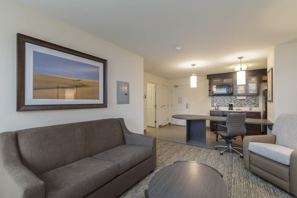 Suite, 1 Bedroom (1 Queen Bed) | Desk, iron/ironing board, free cribs/infant beds, rollaway beds