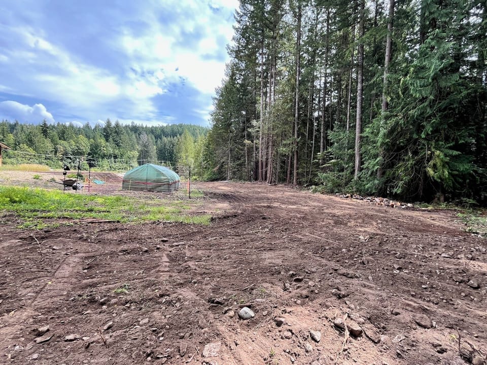 the working side of the property -  greenhouses and livestock space