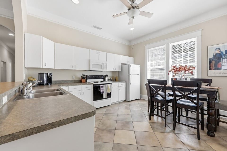 Kitchen & Dining: Spacious, fully equipped kitchen with dining area and plenty of room for group meals.