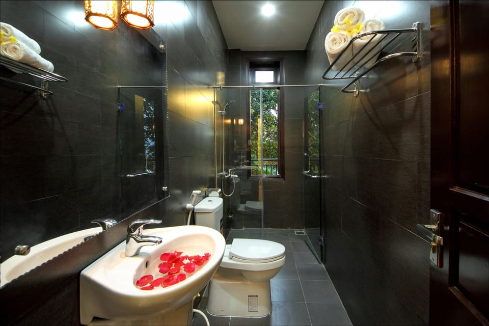 Family Room, Garden View | Bathroom | Shower, free toiletries, hair dryer, bathrobes