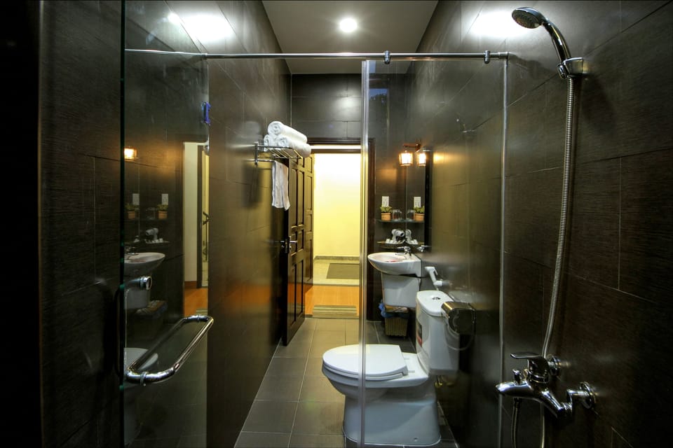 Family Room, Garden View | Bathroom | Shower, free toiletries, hair dryer, bathrobes