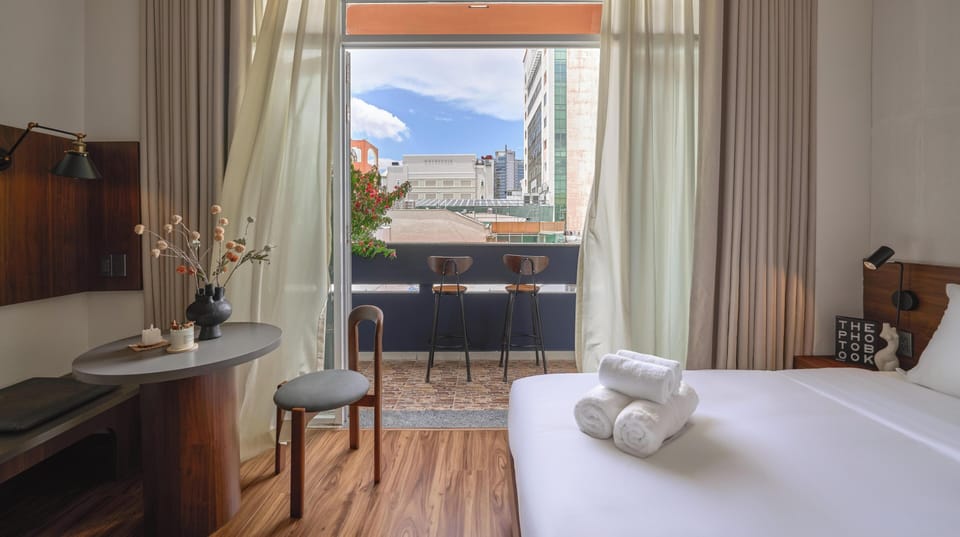 Deluxe Room, City View | Terrace/patio