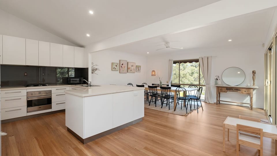 Spacious open-plan kitchen and dining area designed for easy group stays