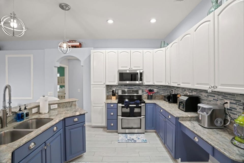 Plenty of counter space and cabinetry make cooking for the whole group easy.