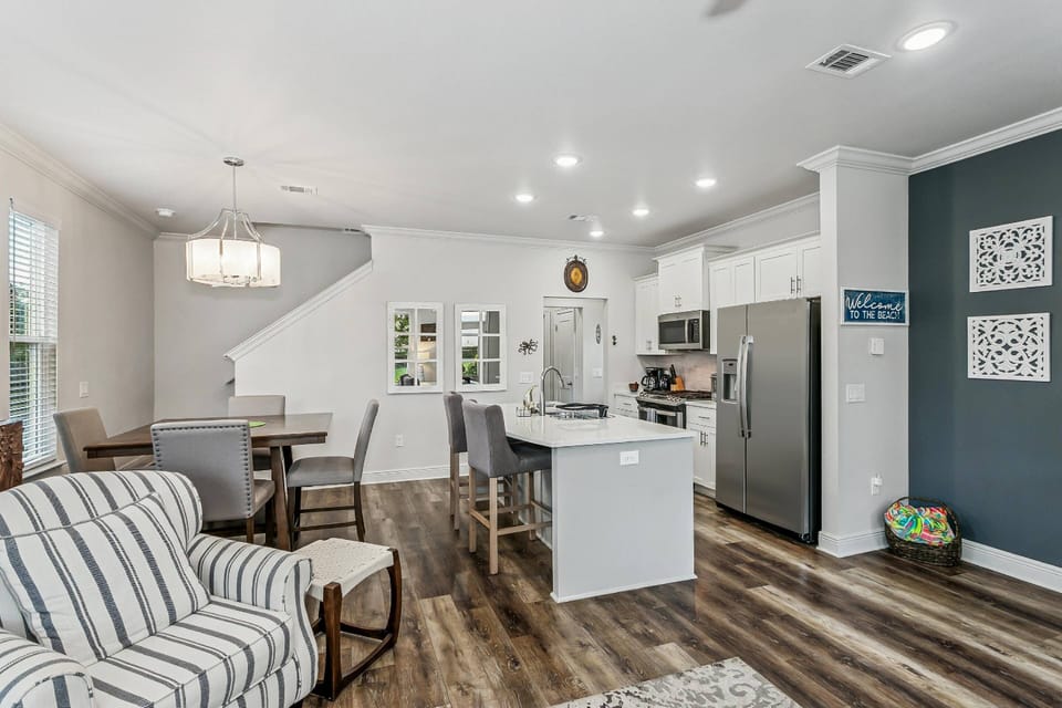 The living room opens to the dining area and kitchen