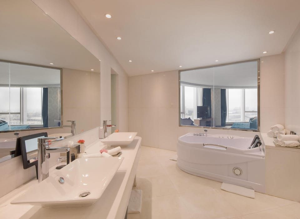 Royal Suite, 1 King Bed | Bathroom | Separate tub and shower, rainfall showerhead, free toiletries