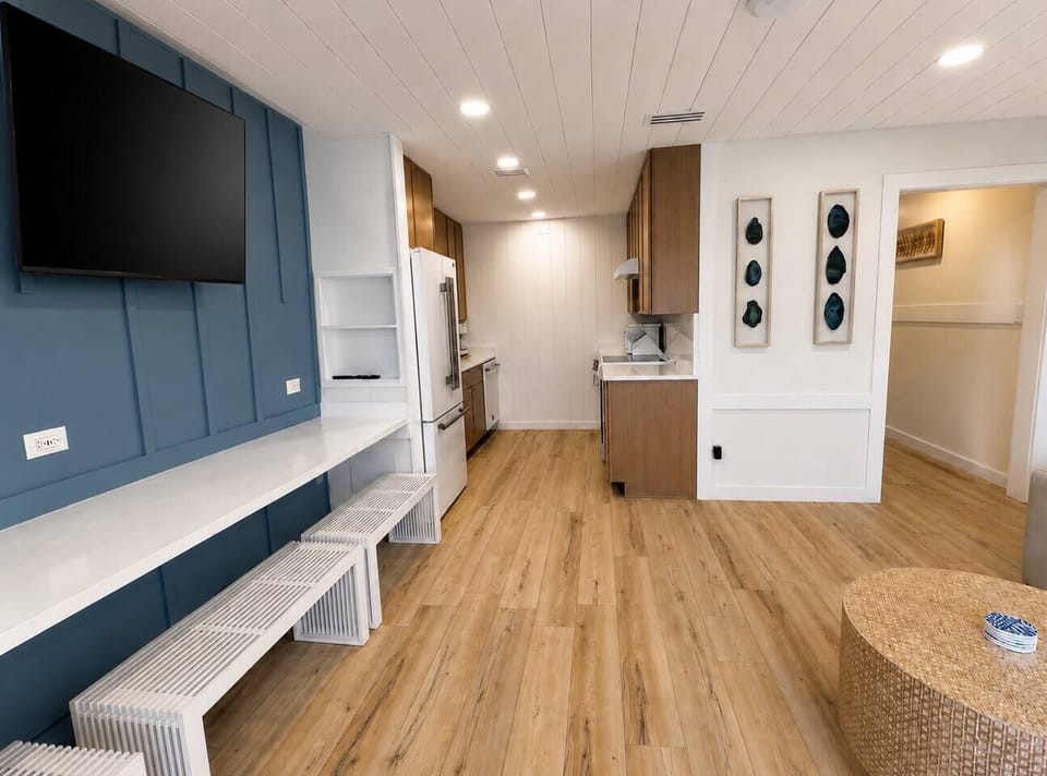 Together Is Better

• The open-concept kitchen and living room keep everyone connected. Cook, watch the 65” Smart TV, enjoy the ocean view, or gather together, all without missing a moment.