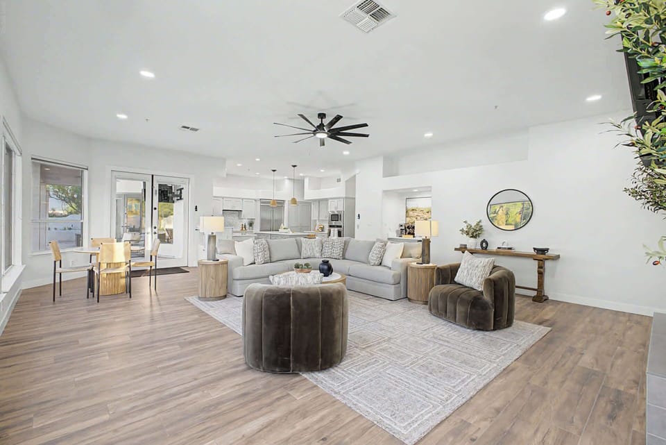 Bright, spacious living area with Roku TV