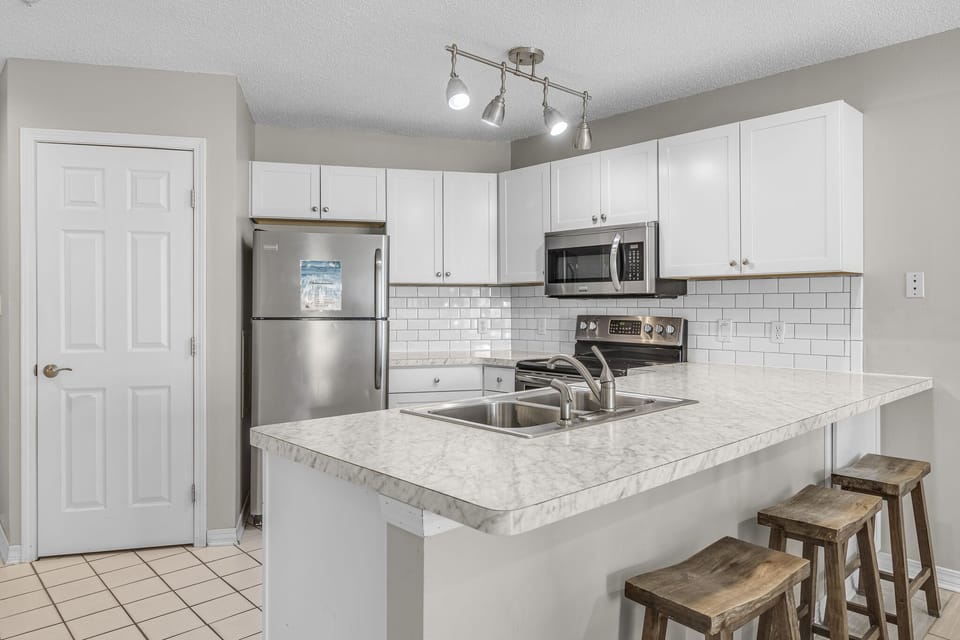 Updated kitchen with stainless steel appliances