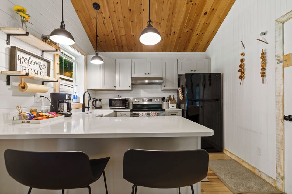 Full Kitchen | 2 bar seating | Coffee Drip | Hot Water Kettle | Dishwasher