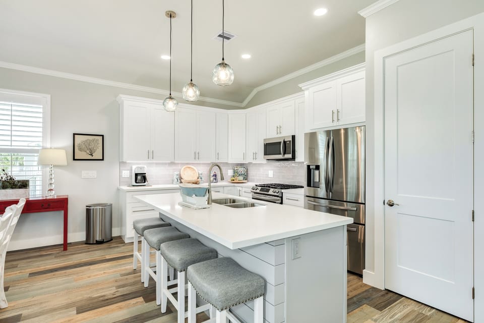 Large kitchen island is great for preparing and serving homecooked meals