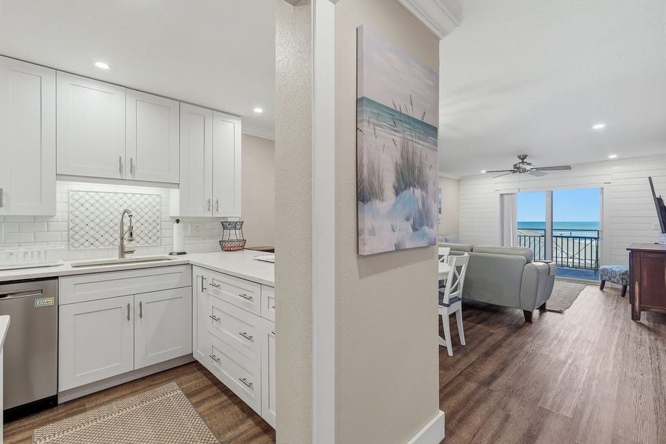 Open concept kitchen, dining, and living room area