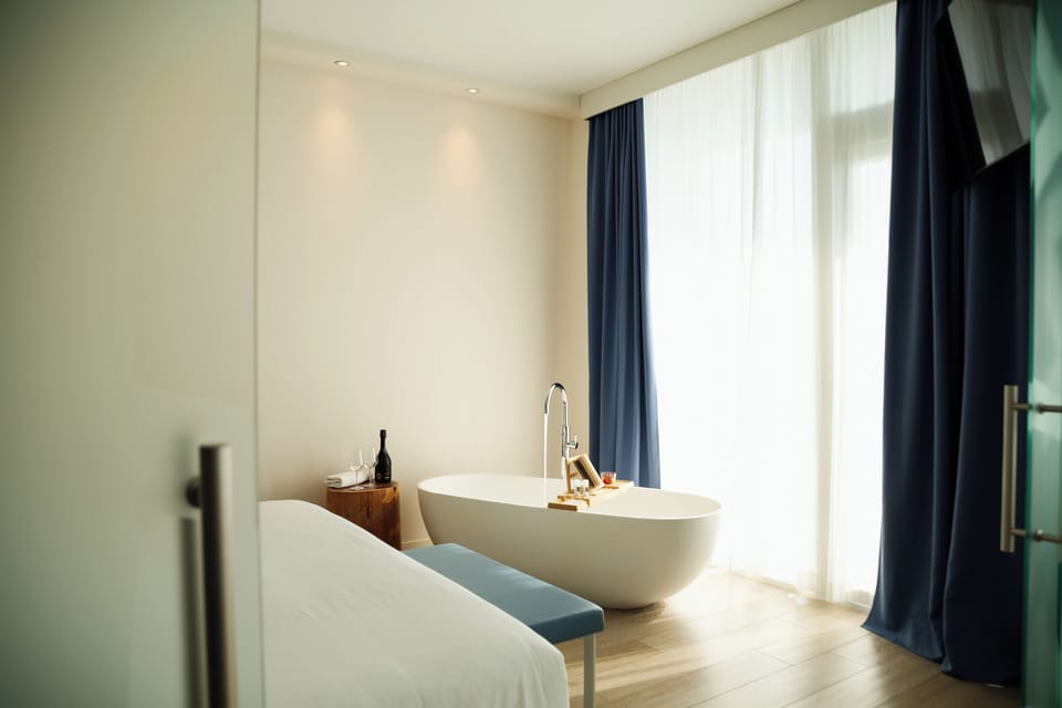 Suite, 1 Double or 2 Twin Beds, Balcony, Sea View | Bathroom | Shower, designer toiletries, hair dryer, bathrobes