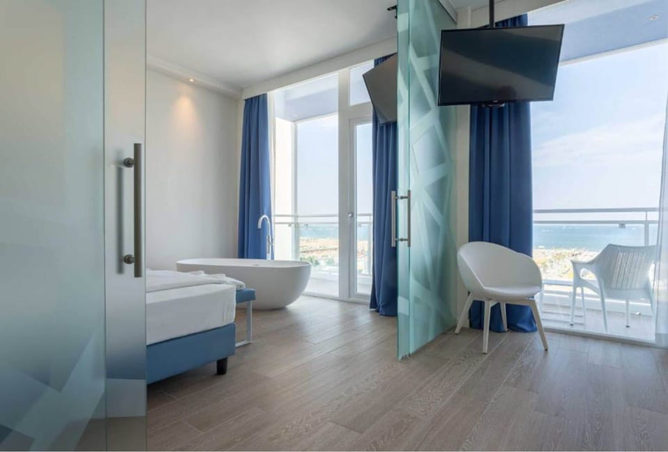 Suite, 1 Double or 2 Twin Beds, Balcony, Sea View | Premium bedding, down comforters, minibar, in-room safe
