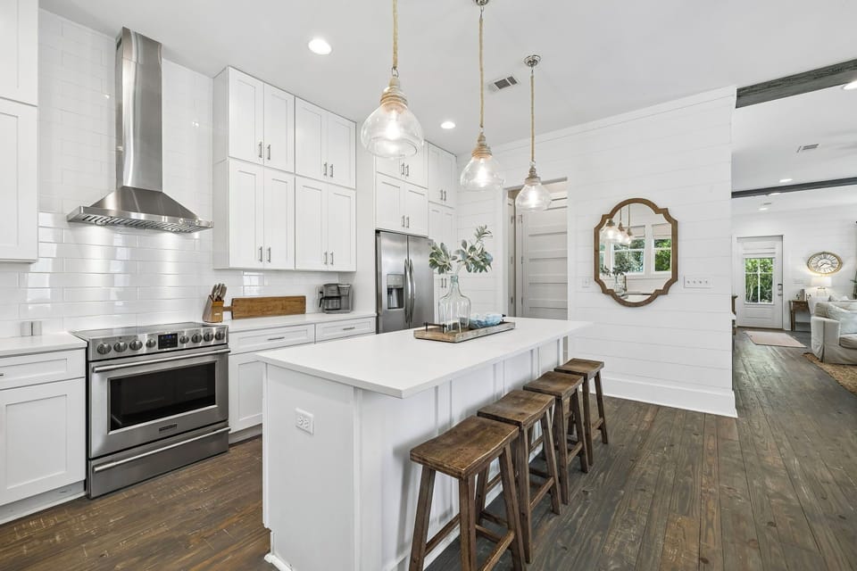 Step into your bright, modern kitchen where cooking becomes a pleasure. The spacious island invites you to gather with family while preparing meals on professional-grade appliances.