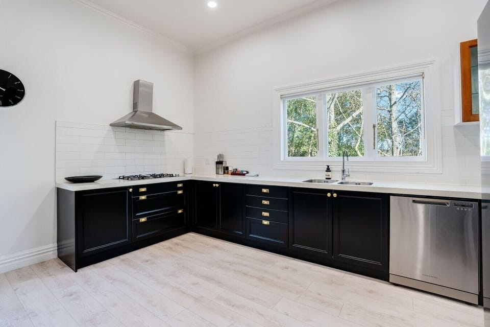 An Chroi Villa`s fully equipped kitchen with generous bench space for preparing meals at home
