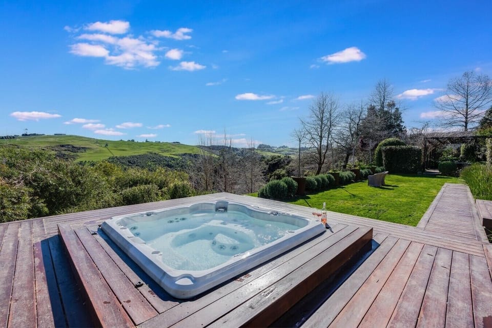 Unwind in the private spa while taking in the sweeping rural outlook