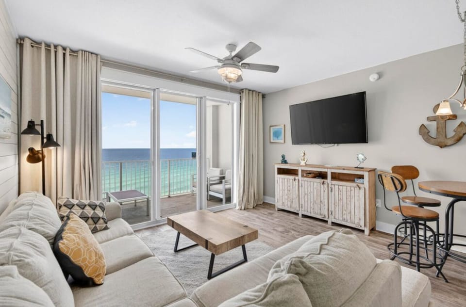 Comfortable living room with sleeper sofa, 65" Smart TV, and Gulf Views! - new furniture and photos coming soon!