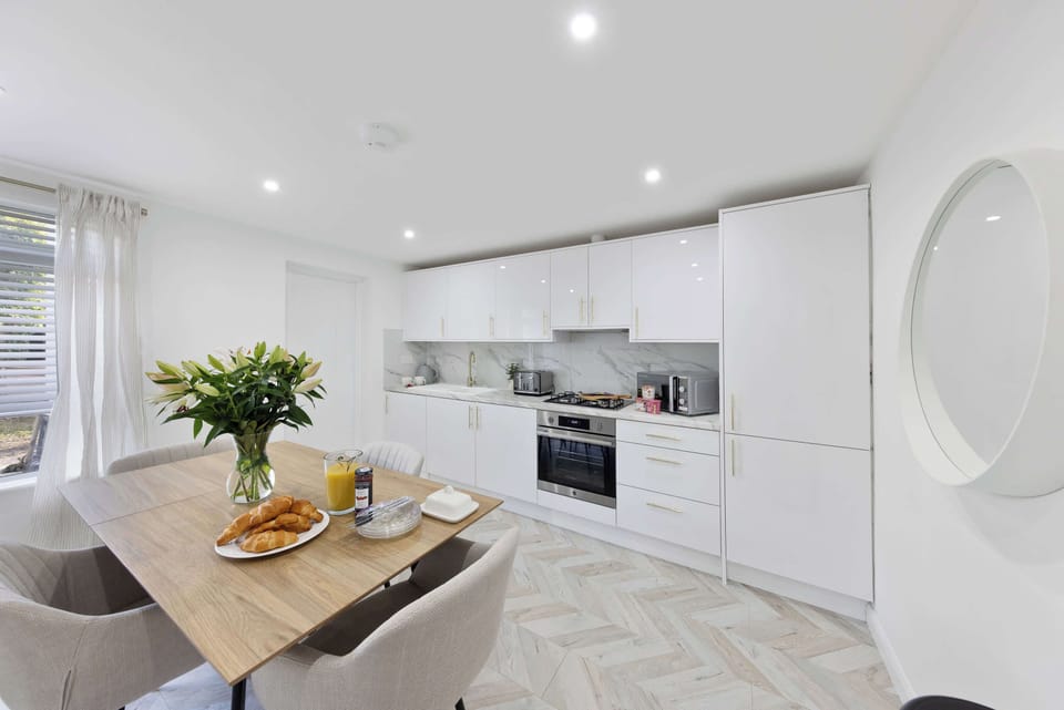Make breakfast part of the experience in the open kitchen and dining area, with a comfortable place to gather over coffee before heading out for the day.