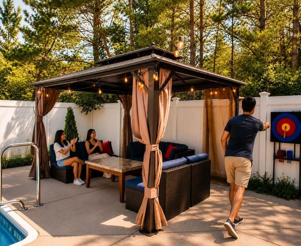 Poolside fun for everyone—kick back beneath the covered gazebo while the games continue just steps away.