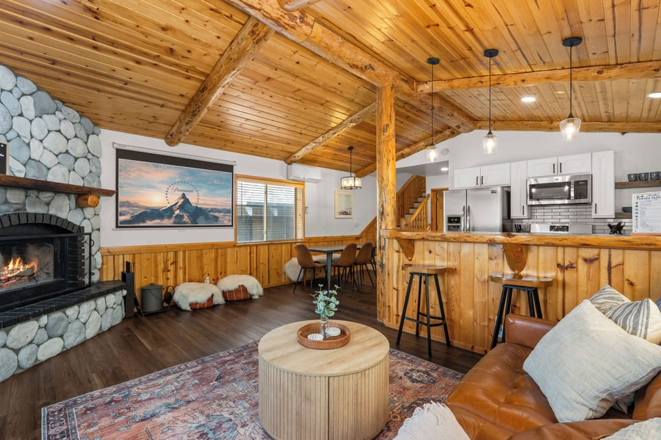 Gather around the movie projector for a cozy movie night with the fireplace.