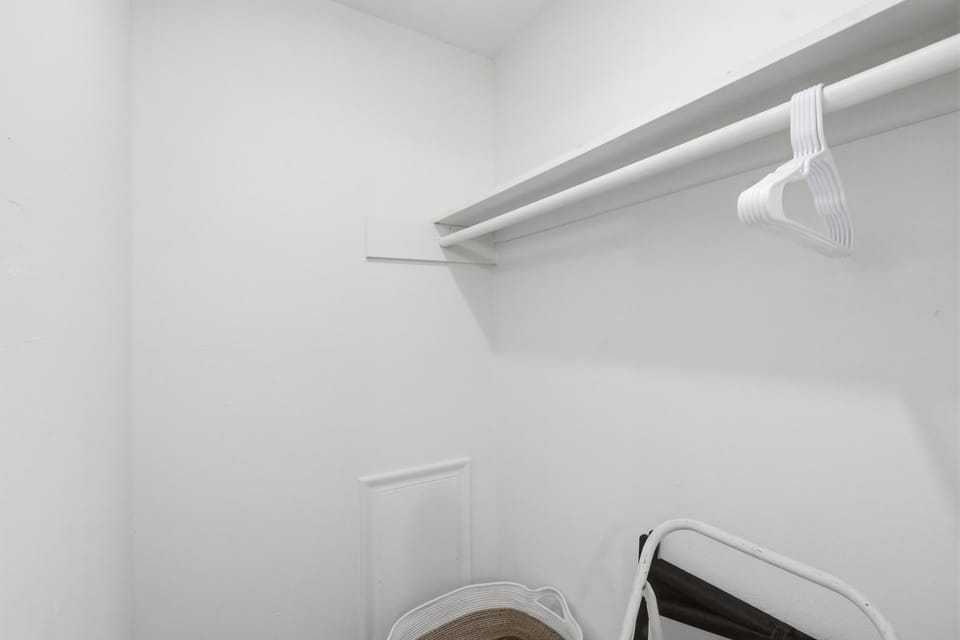 Bedroom 2 Closet with Clothing Storage and Hangers. Plenty of room to unpack for longer Arlington stays or multi-night Cowboys and Rangers weekends.

