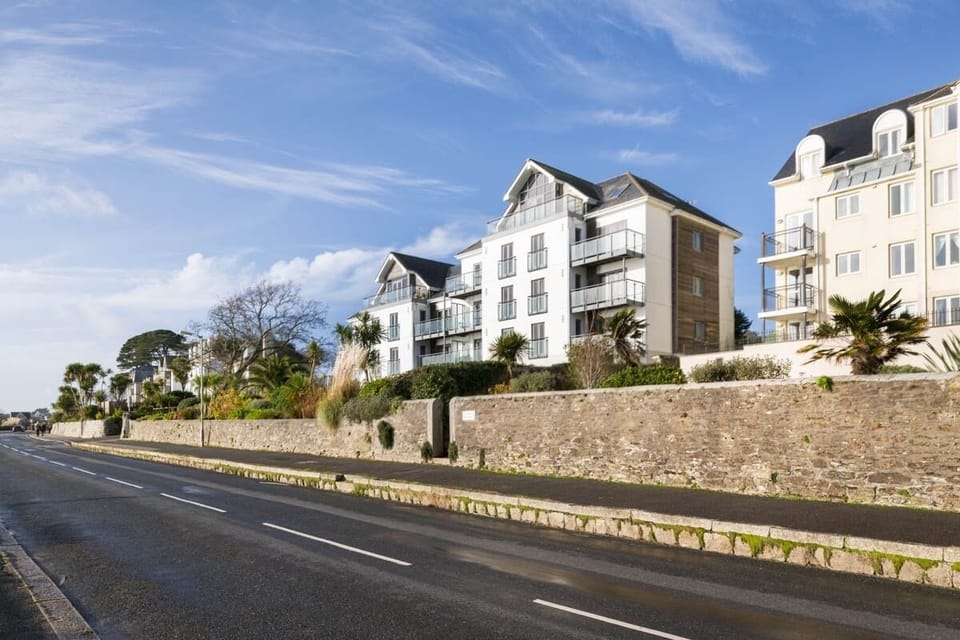 Exterior view of Castle Bay apartment from road Falmouth