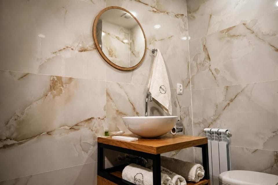 Shower, free toiletries, hair dryer, slippers