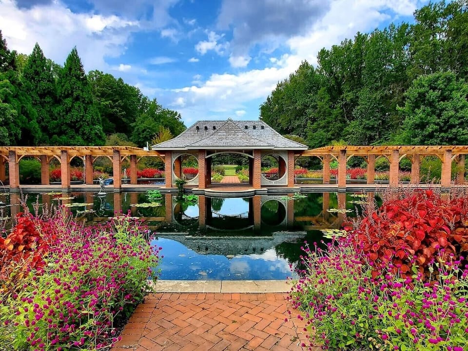 Enjoy seasonal blooms and peaceful trails at the Huntsville Botanical Garden, just 10 minutes away.