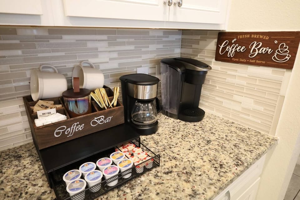 Our coffee bar sets the tone for relaxed mornings—fresh coffee brewing, your favorite mug in hand, and a calm start before a day of adventure or a slow poolside afternoon. Arriving late? No need to rush to the store—coffee is ready when you are.
