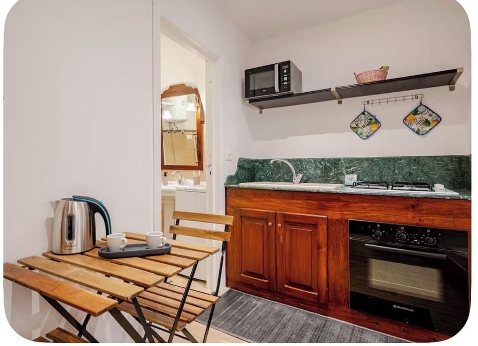 Standard Apartment, 1 Bedroom, Air conditioning, City View | Private kitchen | Microwave, oven, stovetop, highchair