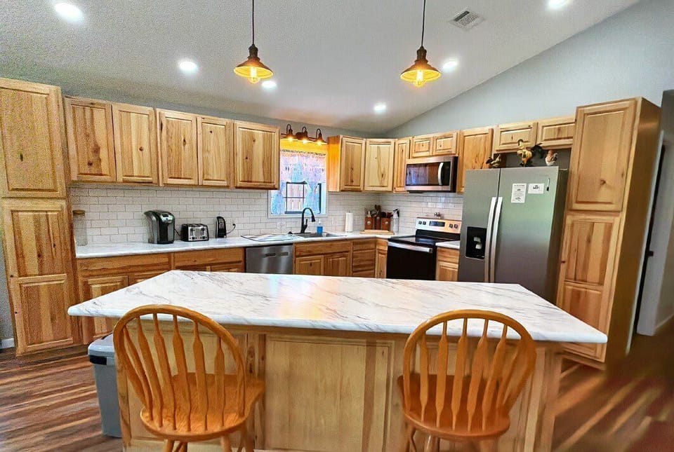 Fully equipped kitchen and dining area for meals together