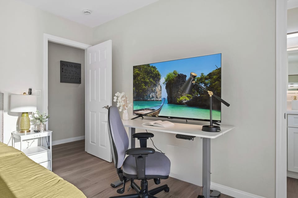 Dedicated workspace with a desk, chair, and fast Wi-Fi for remote work.
