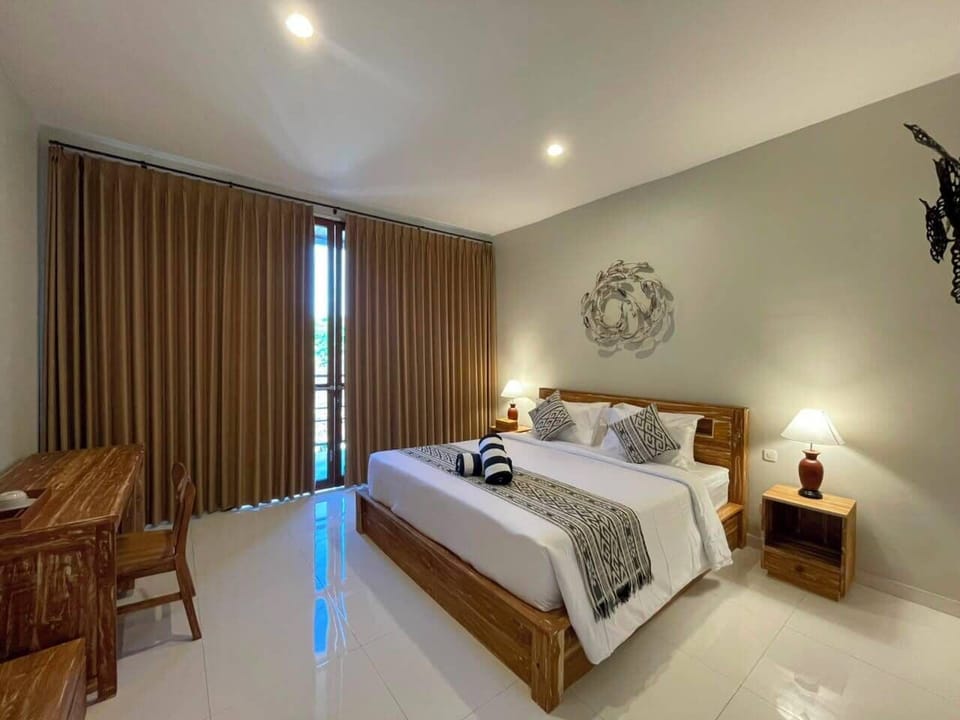Deluxe Room, Pool View | Desk, laptop workspace, WiFi (free)
