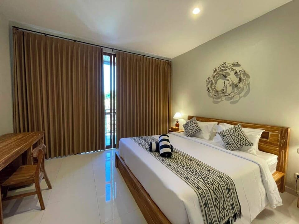 Deluxe Room, Pool View | Desk, laptop workspace, WiFi (free)