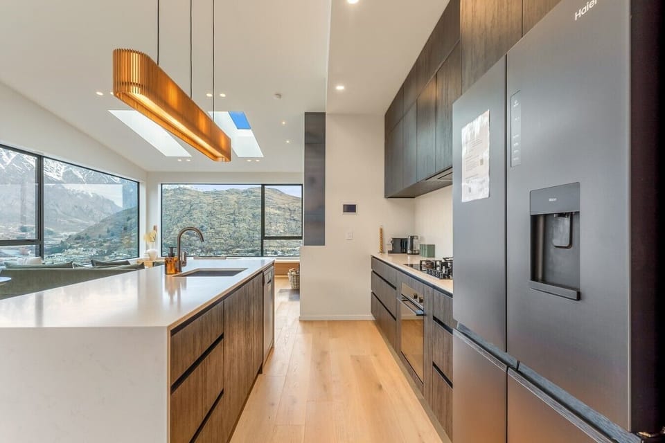 The kitchen sits at the centre of the top floor