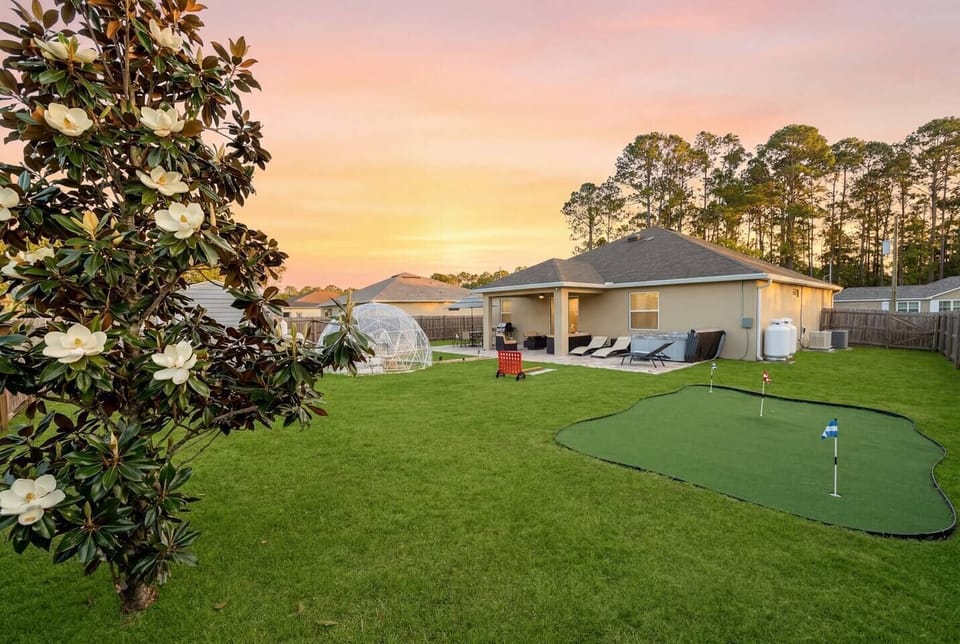 Golden hour hits different when this is your backyard. Sprawling green lawn, open skies, and total privacy — room to breathe, play, and unwind.
