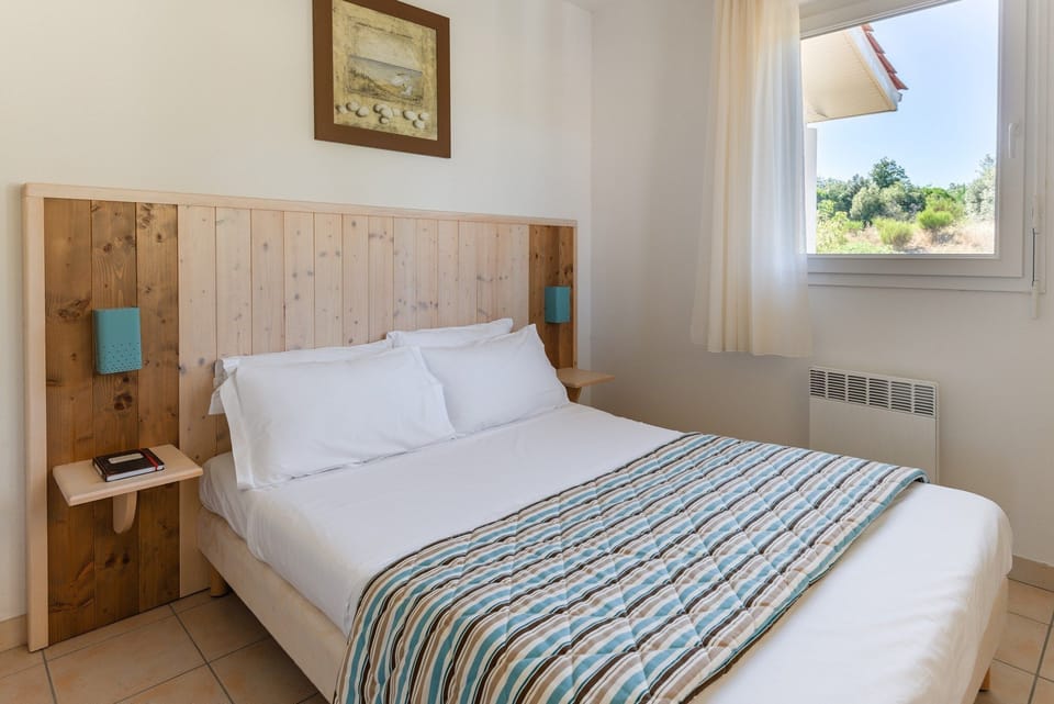 Drift to sleep in a comfortable bed after a wonderful day outside.