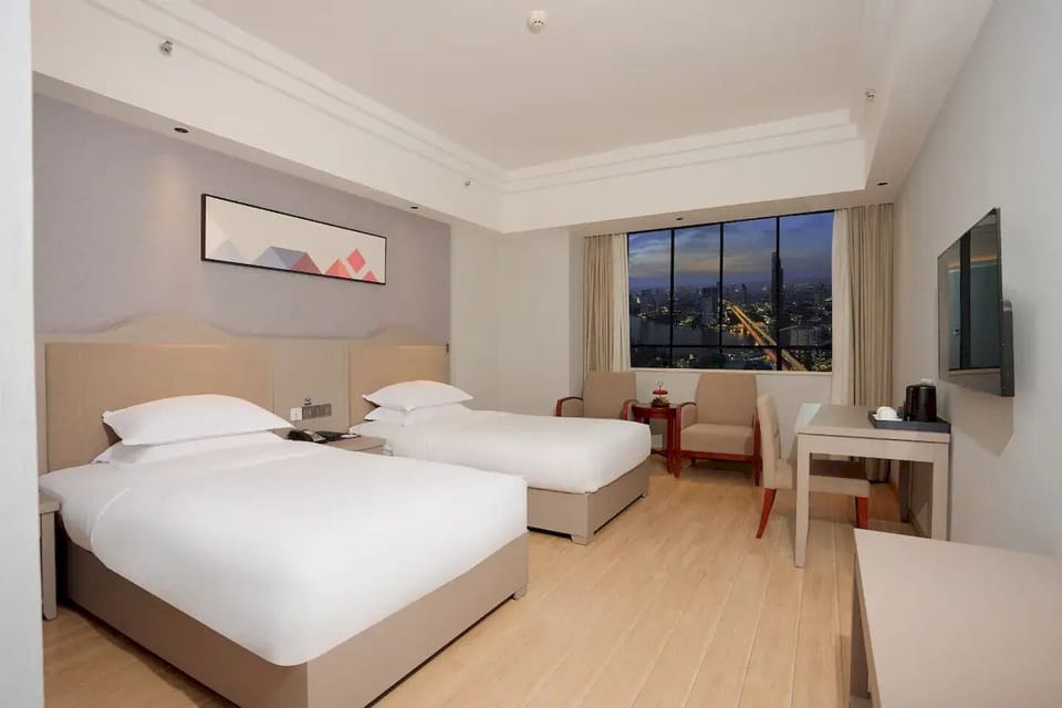 Superior Twin Room, City View | Desk, laptop workspace, WiFi (free), bed sheets