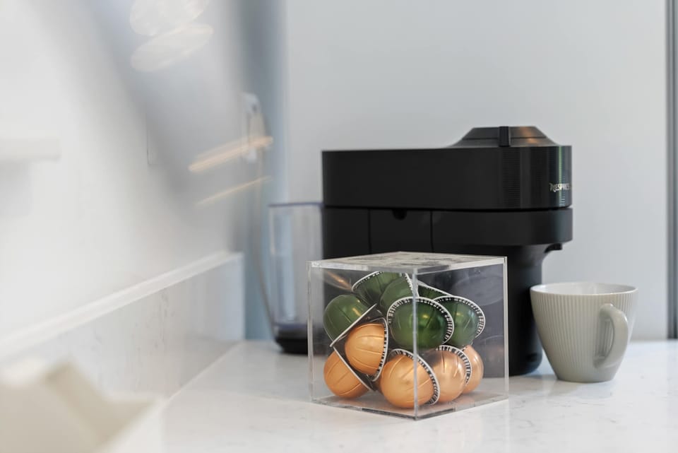 The fully equipped kitchen at Blue Puffin Stays make it easy to enjoy a home-cooked meal with family plus a ready-to-use washing machine for added convenience in doing your laundry