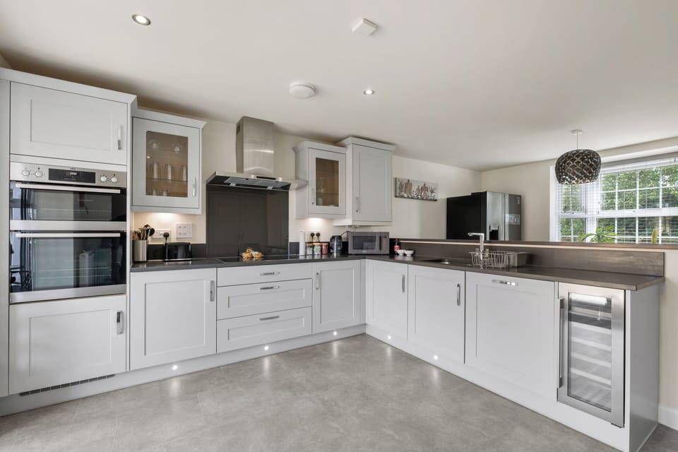 Kitchen and dining area on the other side of the sink 