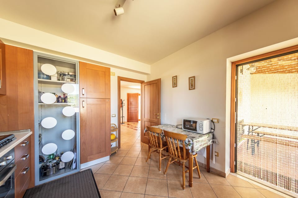 Villa, Balcony, Pool View | Private kitchen