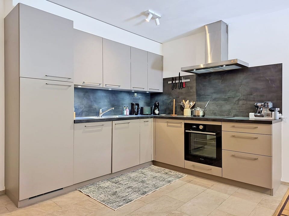 Kitchen Appliance, Kitchen, Countertop, Cabinetry, Furniture, Major Appliance, Flooring, Interior Design, Wood, Home Appliance