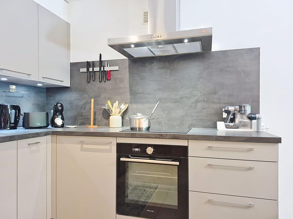 Countertop, Kitchen, Kitchen Appliance, Flooring, Major Appliance, Cabinetry, Home Appliance, Interior Design, Floor, Furniture