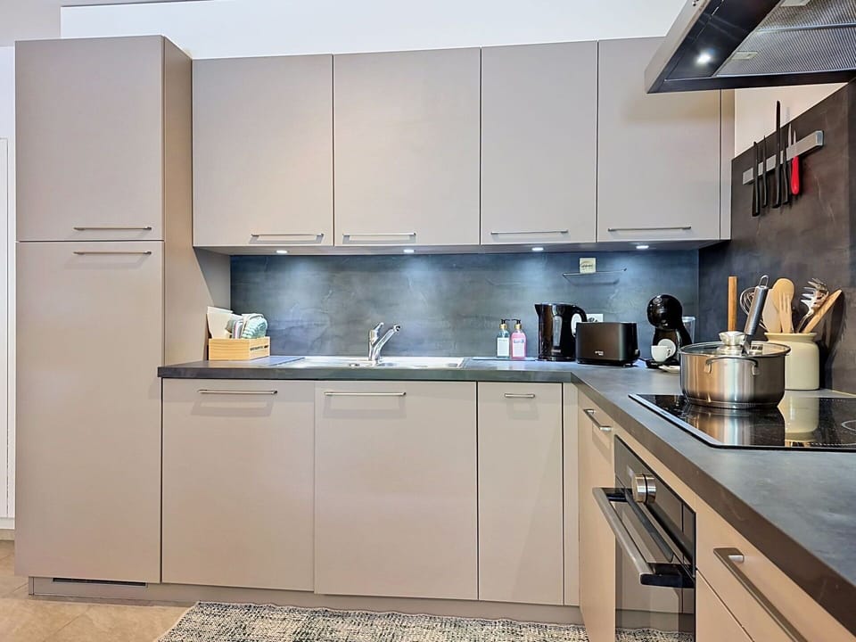 Kitchen Appliance, Kitchen, Countertop, Cabinetry, Major Appliance, Furniture, Home Appliance, Interior Design, Kitchen Stove, Flooring