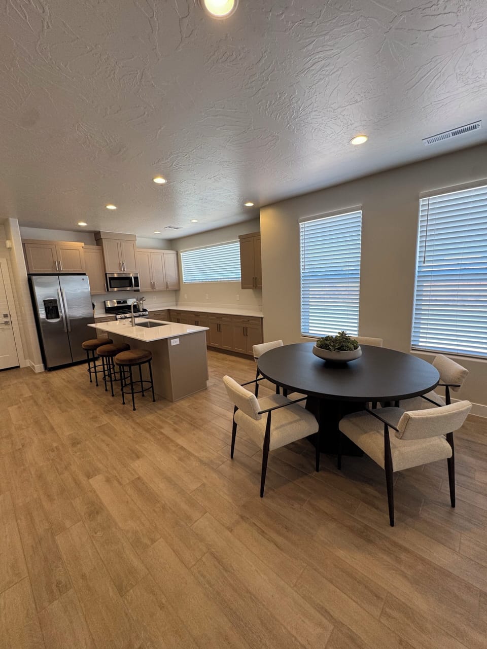 Main floor living area with kitchen and dining space