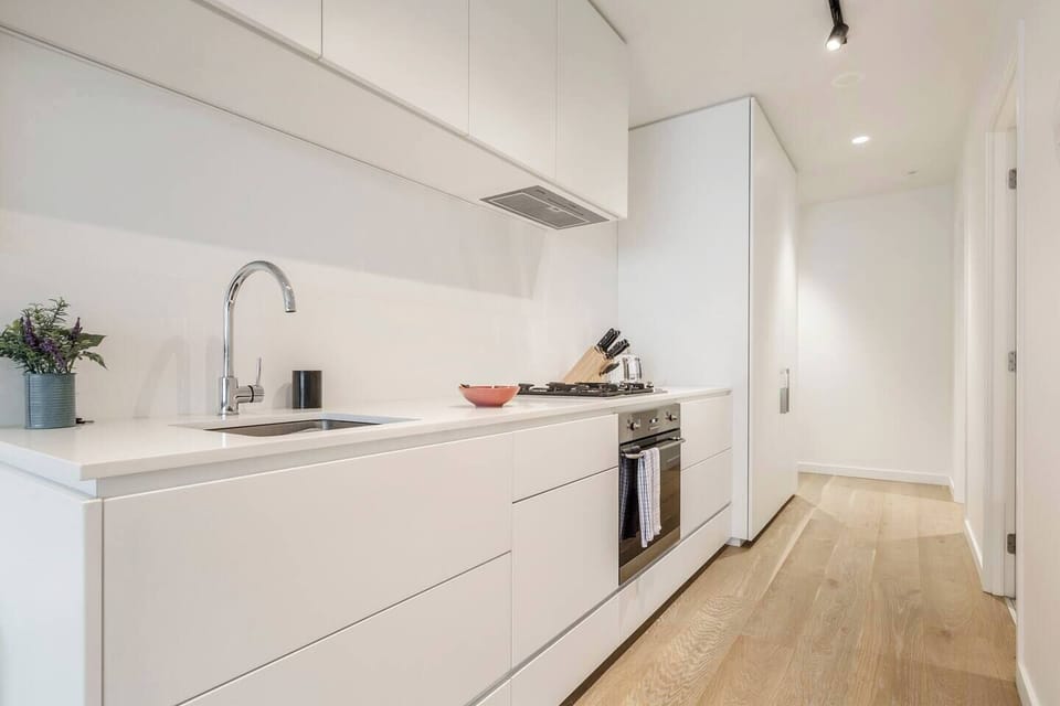The kitchen is well equipped for your catering needs with sleek appliances and cooking utensils.