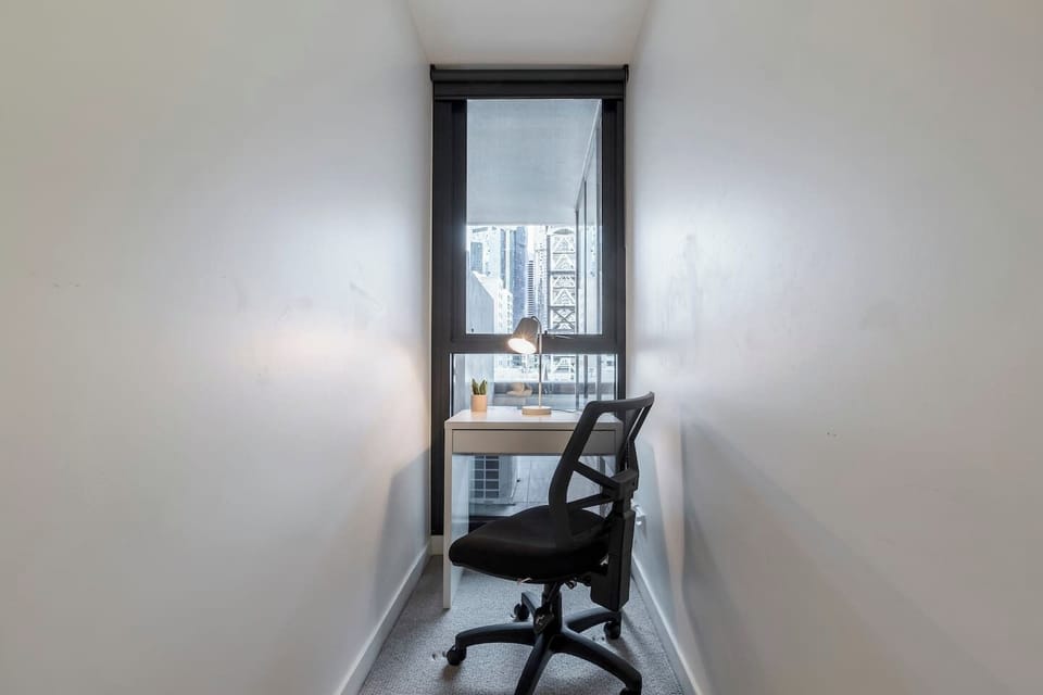 A dedicated workspace within the bedroom creates a cosy nook for setting up your laptop.
