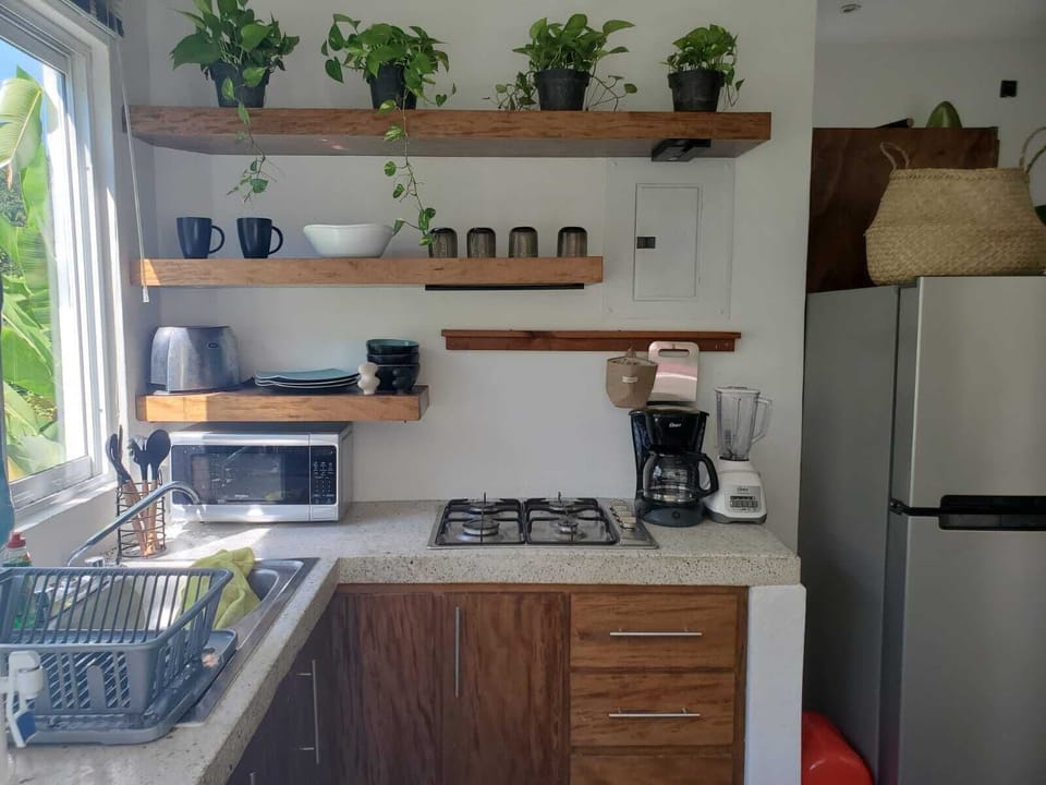 Comfort Room, Patio, Garden View | Private kitchen